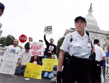 Antiwar protesters staged a sit-down at the Capitol during debate on the Iraq resolution.