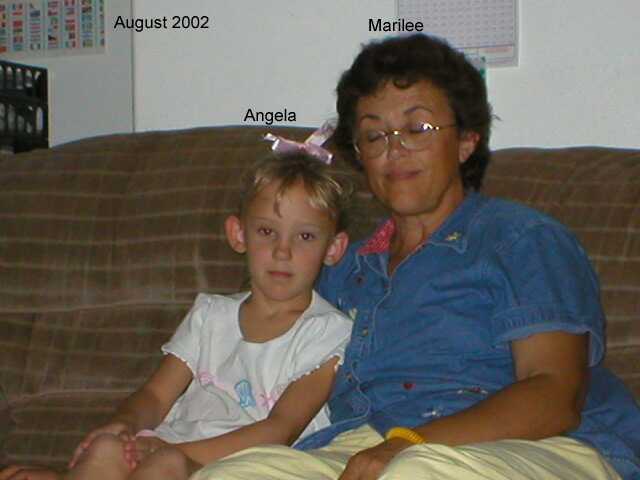 August of 2002 - Marilee with one of her twenty eight grandchildren