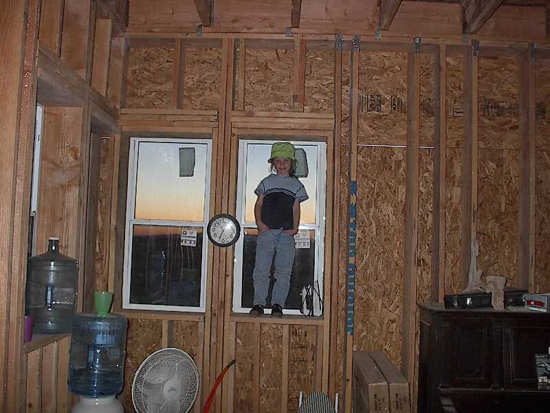 Year 2002 - Isn't Lindsay cute? Just standing in the Window!