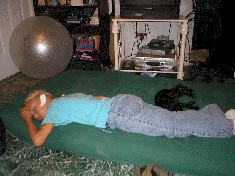 09 August 2004 - Angie and Ebony, asleep in Paradise