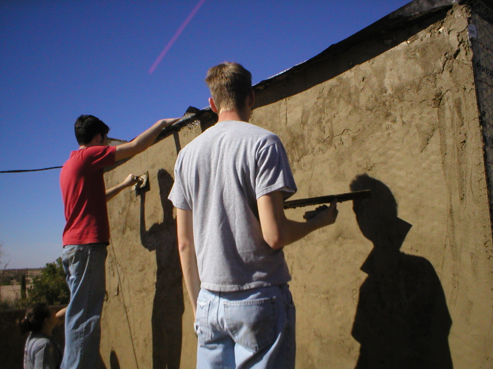 05 February 2005 - David and Andrew - putting Stucco on the West Cube