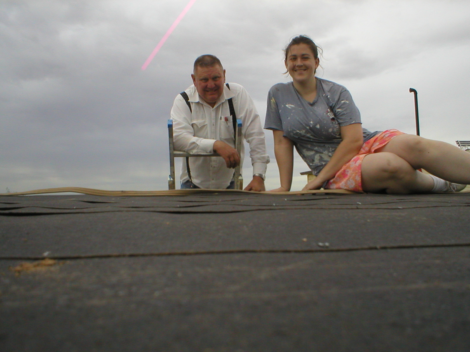 17 February 2005 - Thursday - Wendell and Bridgette putting Roofing Paper on the West Cube